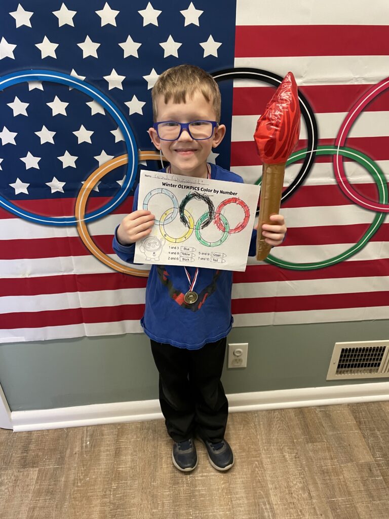 Kaleb-is-in-the-winners-circle-for-consistently-using-a-tripod-grasp-while-coloring-and-writing--768x1024